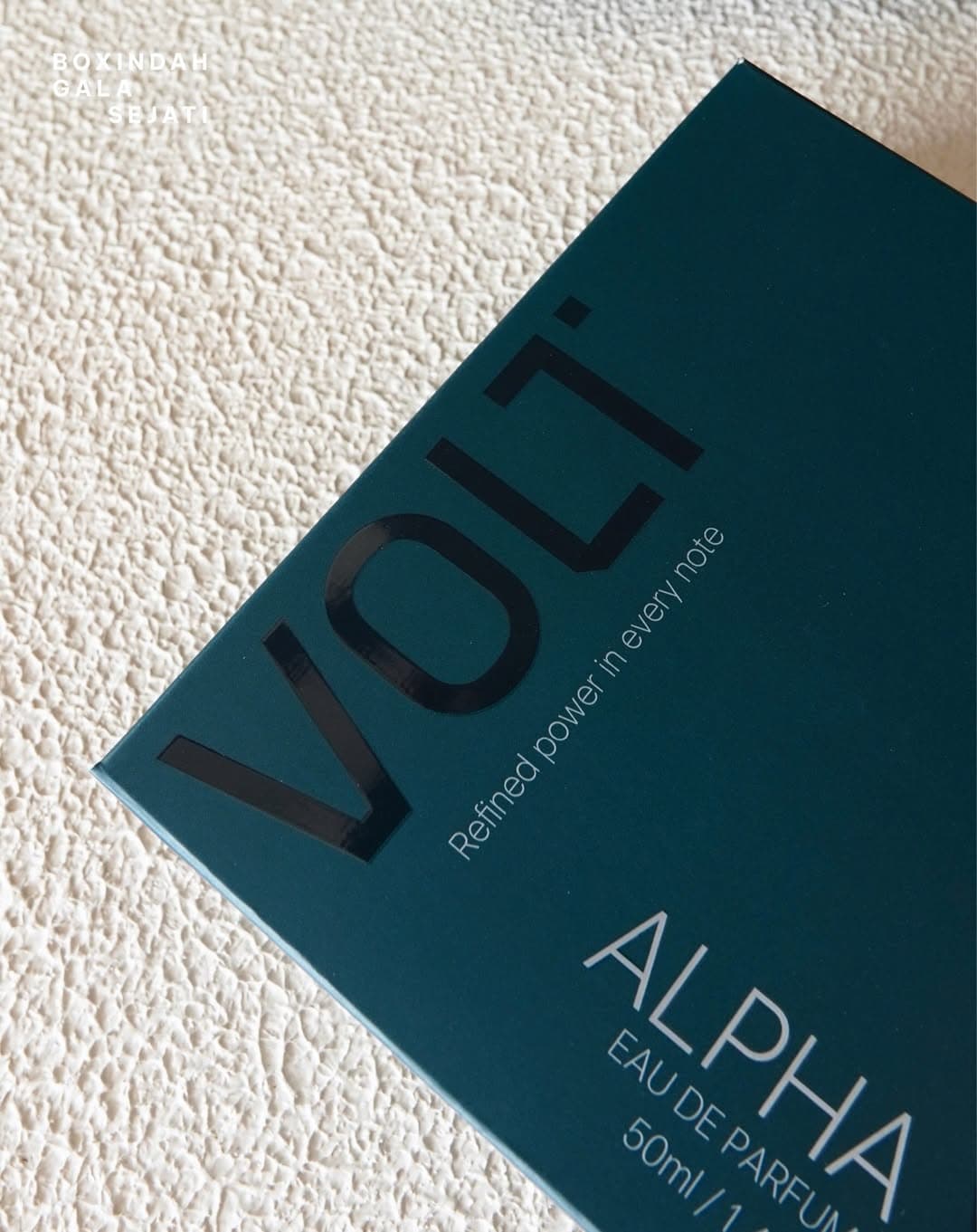 Volti Alpha eau de parfum box in matte teal with a gloss spot UV logo, printed by BGS Jakarta
